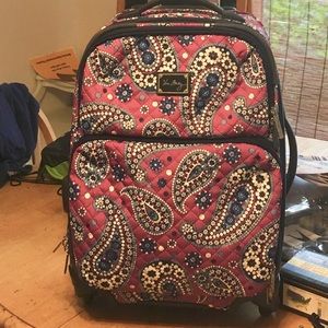 Vera Bradley Boysenberry rolling luggage.